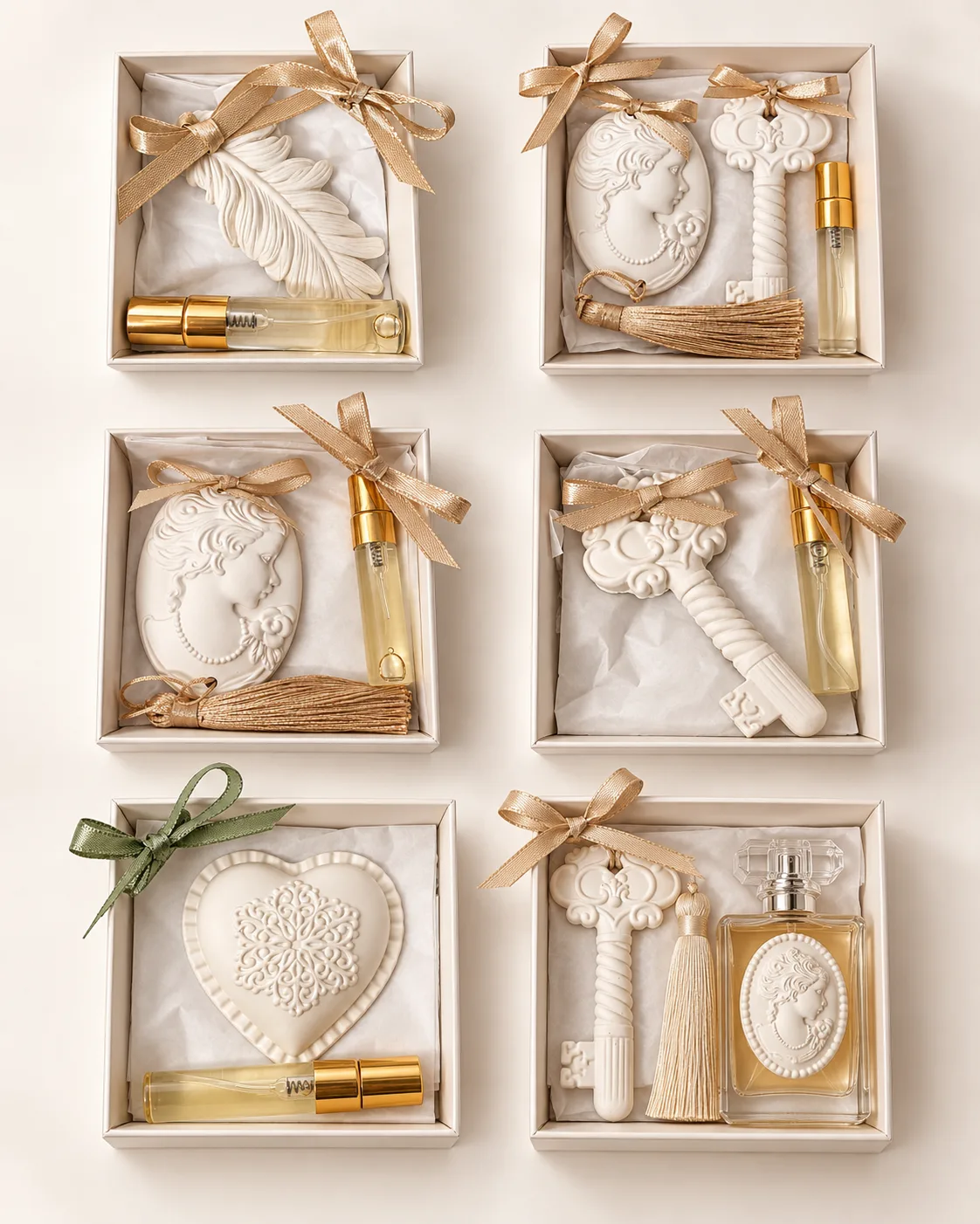 Seis caixas de presente com peças de gesso perfumado, frascos e laços